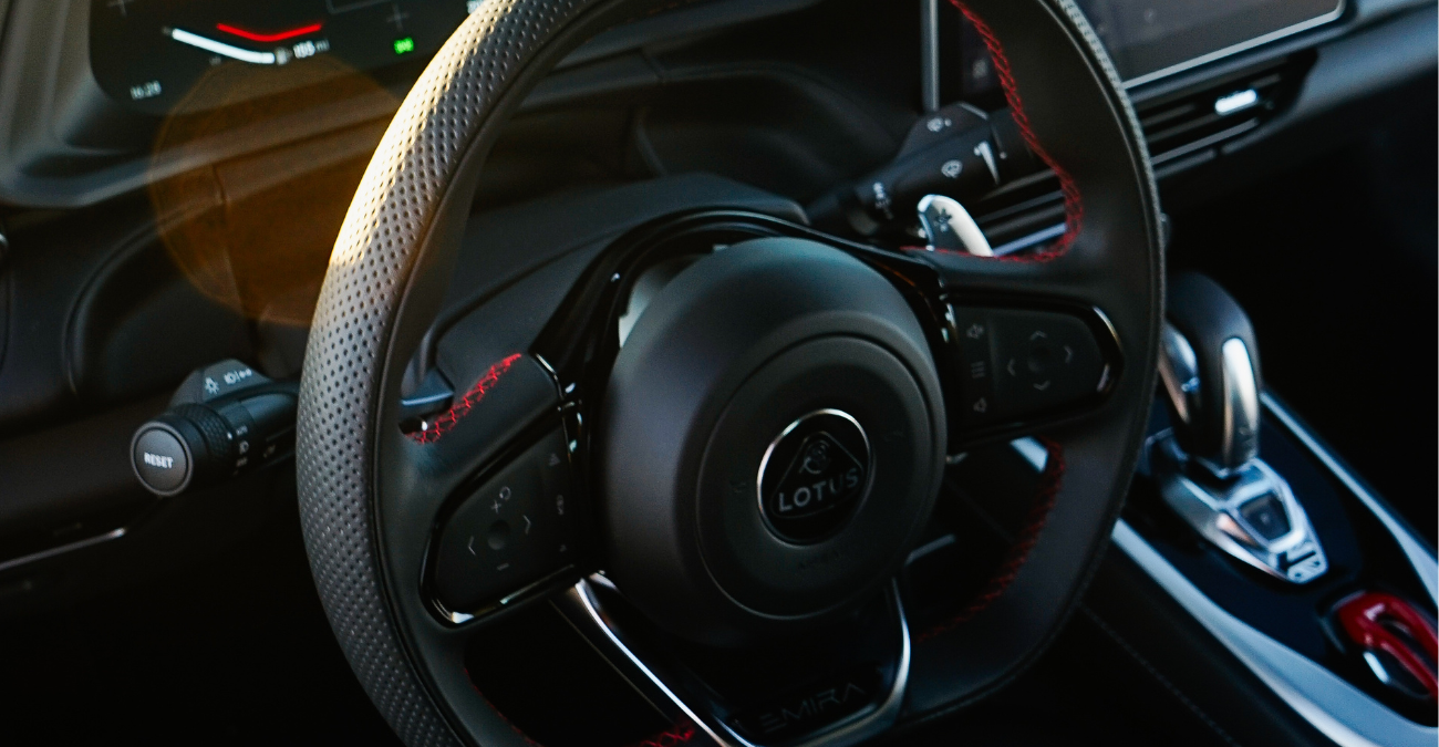 Lotus Emira V6 Silver rear angle supercar OC rental