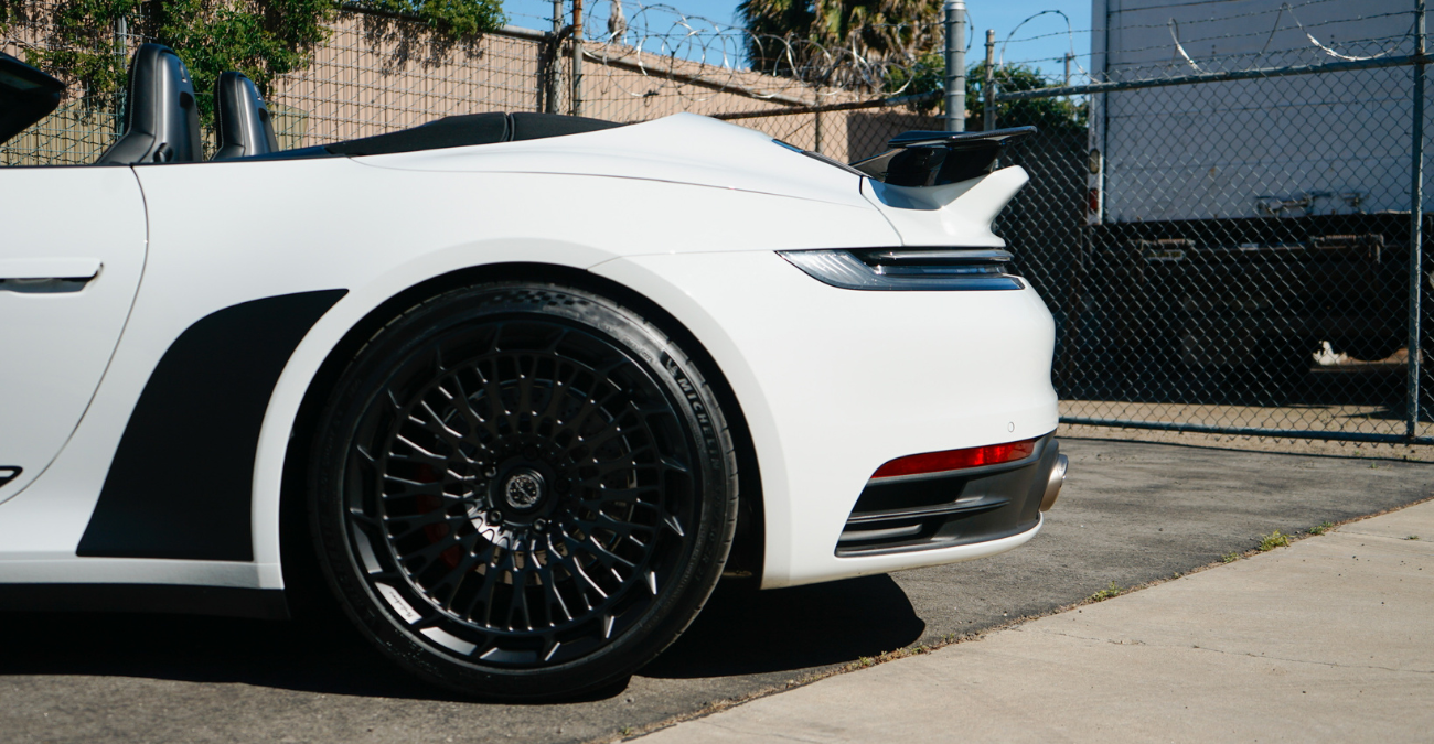 Porsche 911 Carrera 4S Cabriolet White trunk view luxury rental Pacific Coast Highway