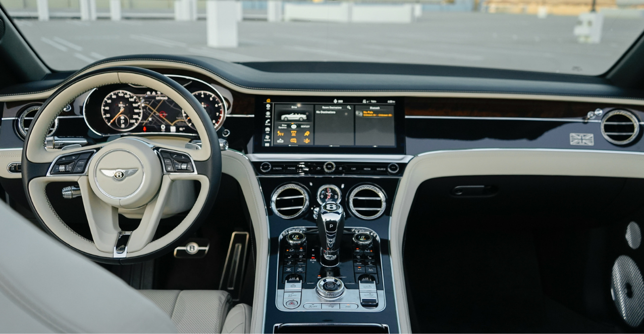 White Bentley Continental GTC First Edition front quarter angle Pacific Coast Highway rental