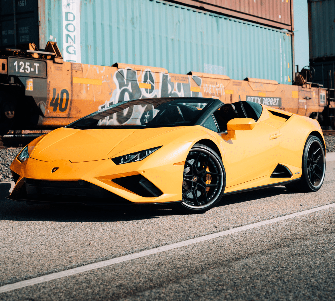 Yellow 2021 Lamborghini Huracan EVO Spyder supercar rental Beverly Hills