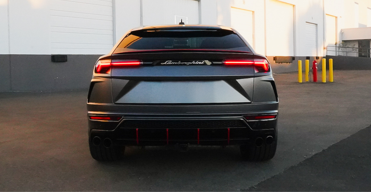 Lamborghini Urus Matte Grey close-up luxury SUV rental Newport Beach