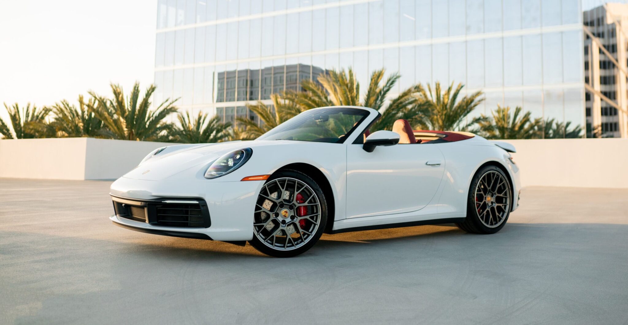2023 Porsche 911 Carrera 4S Convertible Silver sports car available for rent in Orange County