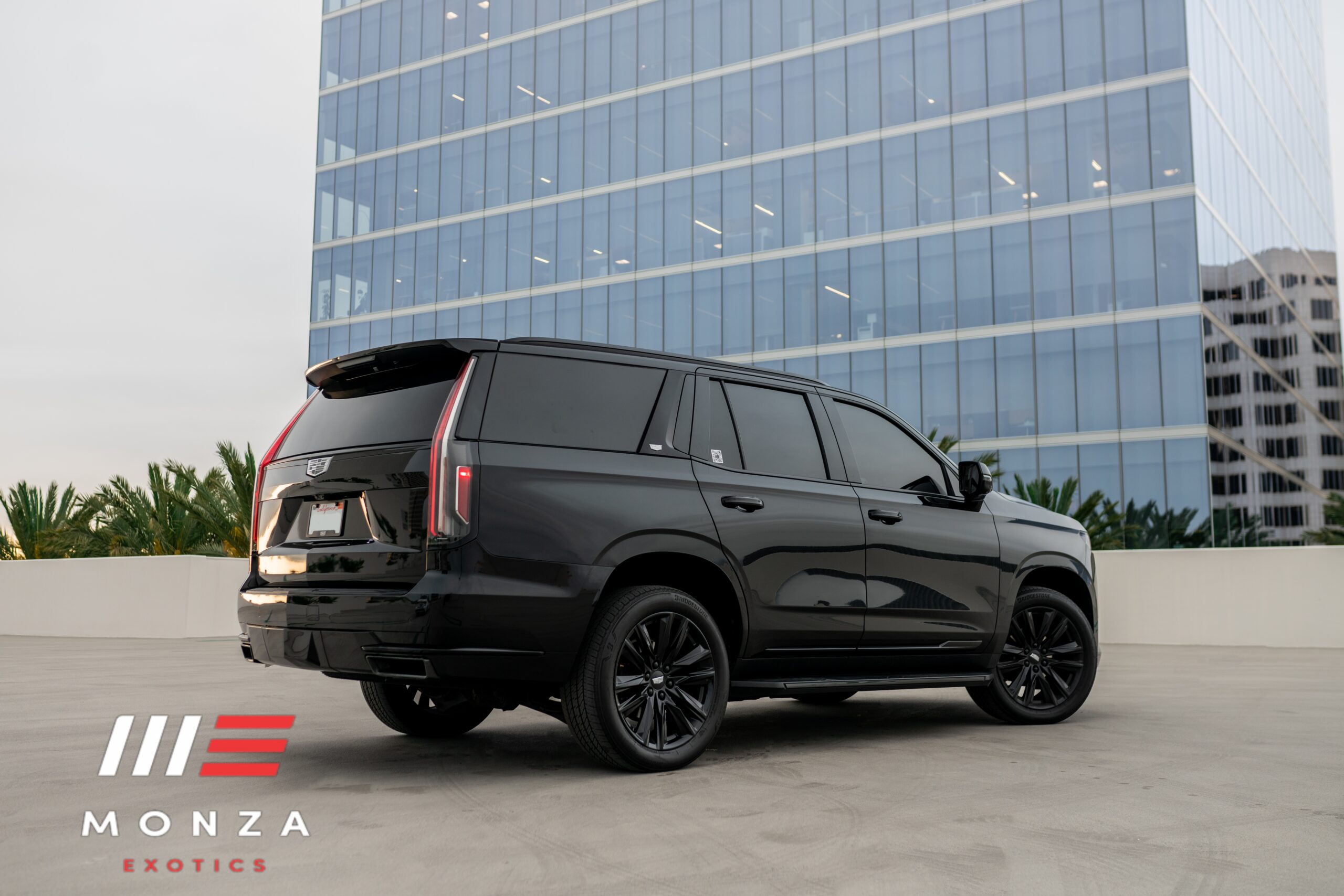 Cadillac Escalade rear view Black luxury SUV San Diego