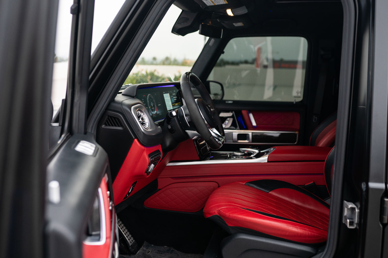 2023 Mercedes-Benz G63 AMG front three-quarter Matte Gold SoCal