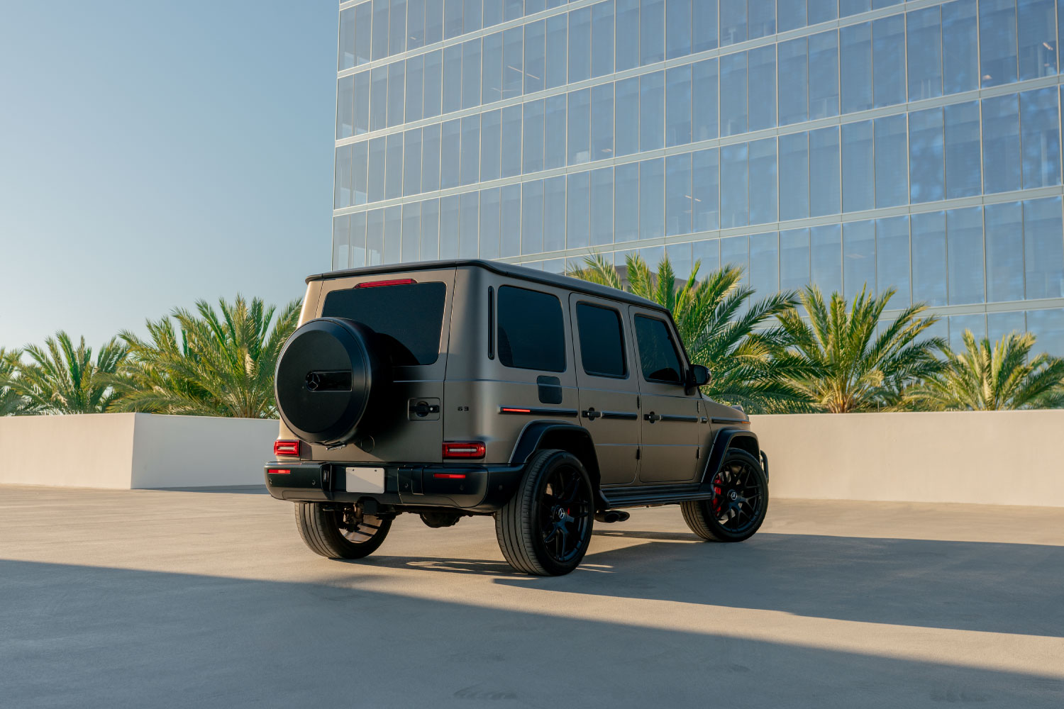 Mercedes-Benz G63 AMG Matte Gold close-up luxury SUV rental Newport Beach