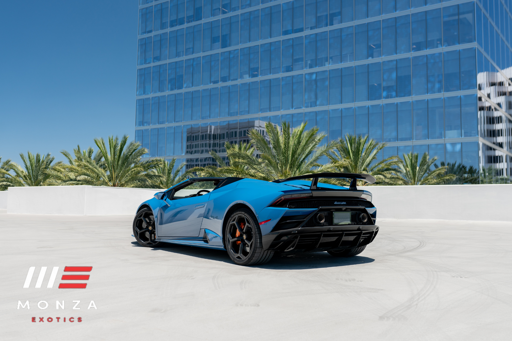 Lamborghini Huracán Evo Spyder Blue trunk view luxury rental Pacific Coast Highway exotic rental