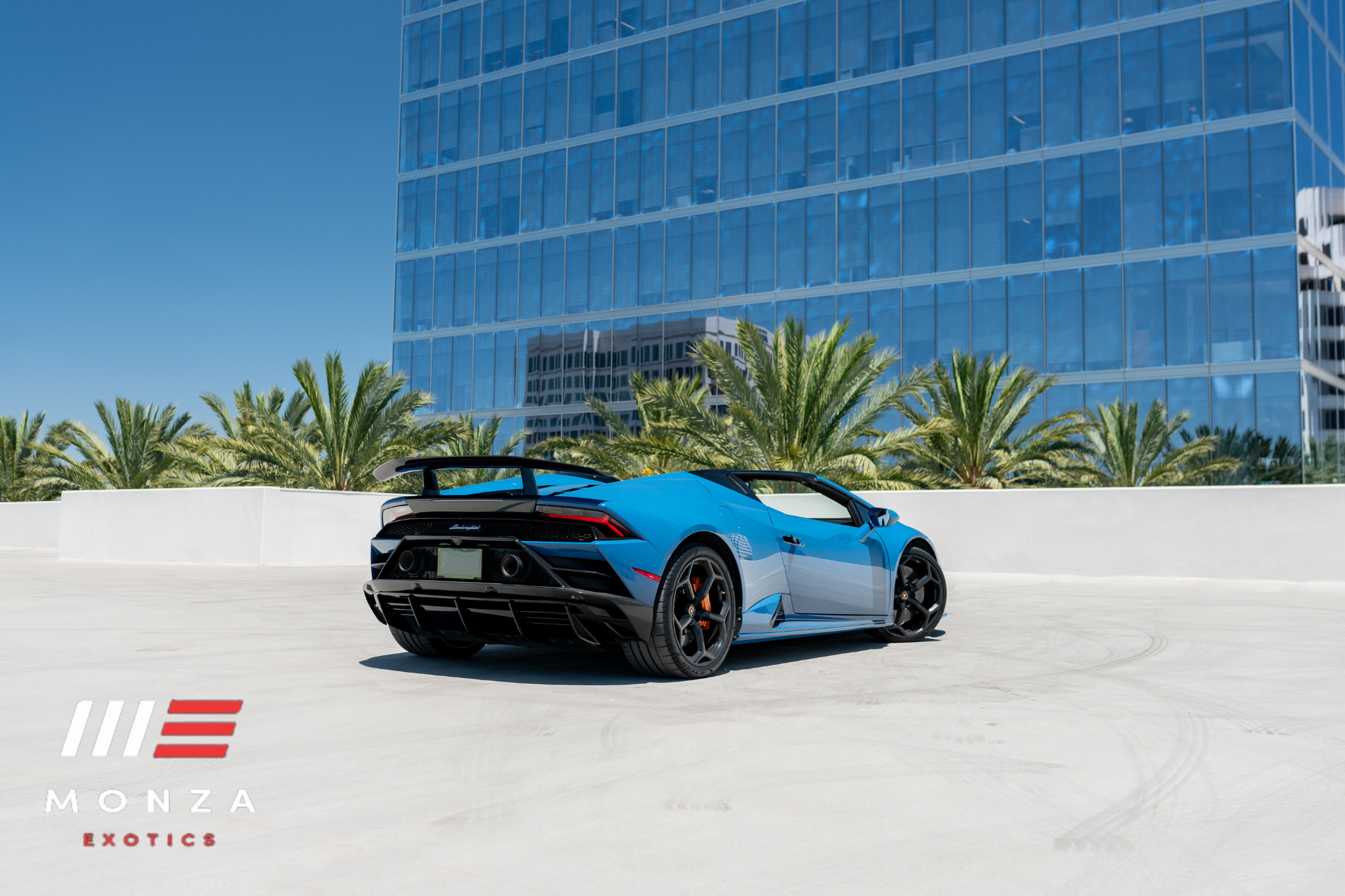 Lamborghini Huracán Evo Spyder rear view Blue supercar San Diego