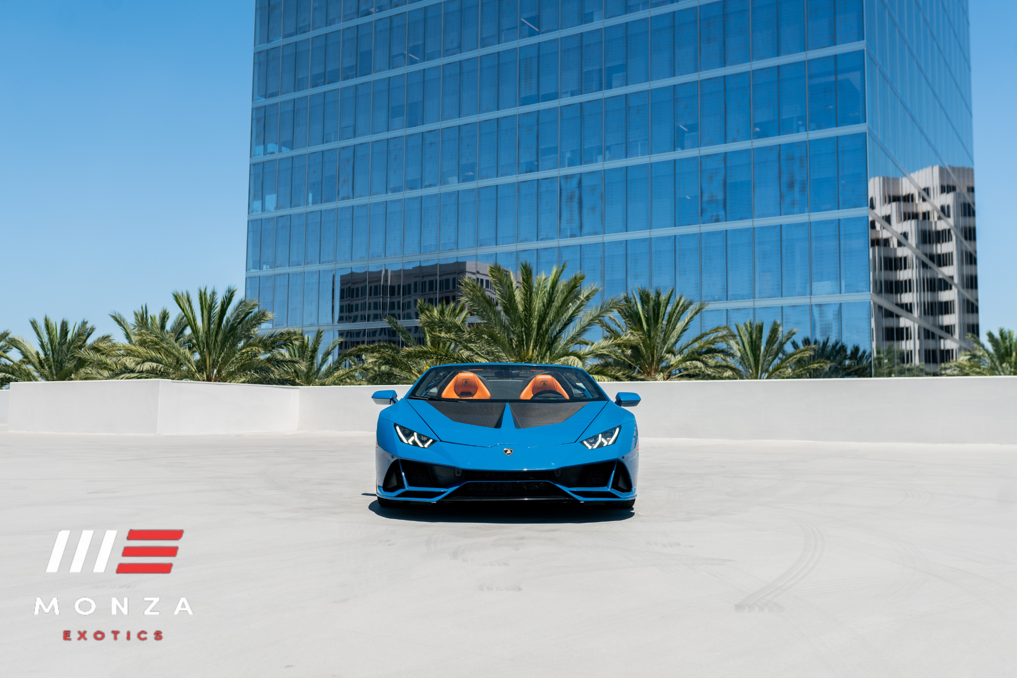 2022 Lamborghini Huracán Evo Spyder Blue rear view exotic car rental