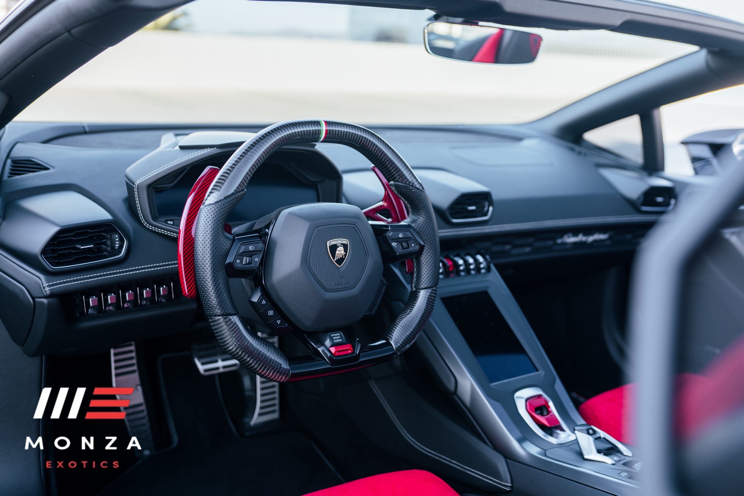 Lamborghini Huracán Evo Spyder rear view Black supercar San Diego