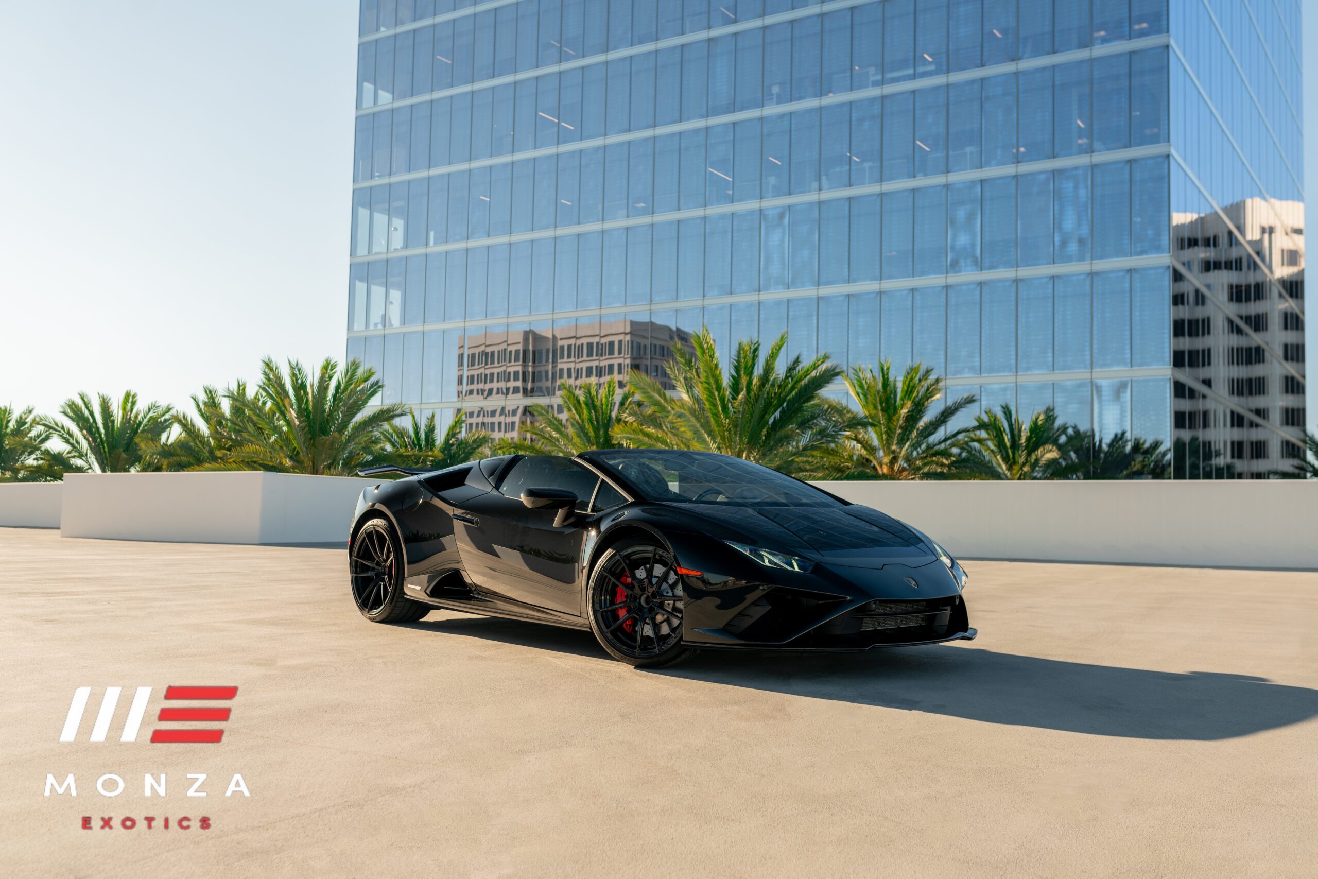Lamborghini Huracán Evo Spyder Black at dusk Orange County exotic rental