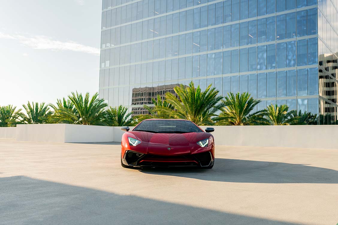 2019 Lamborghini Aventador SV Red rear view exotic car rental