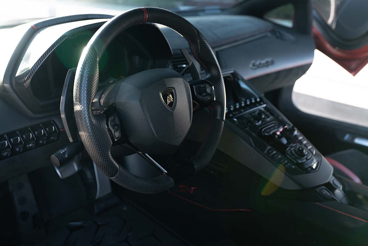 Lamborghini Aventador SV Red rear quarter view Los Angeles exotic rental