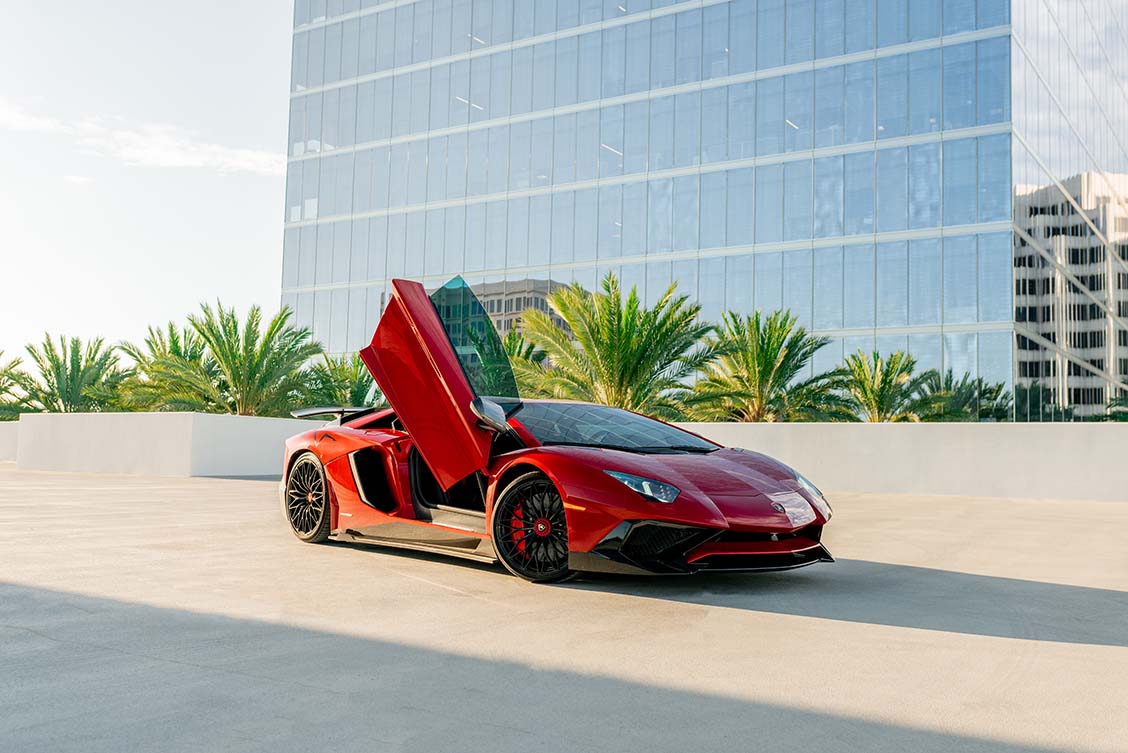Lamborghini Aventador SV Red trunk view luxury rental Pacific Coast Highway exotic rental