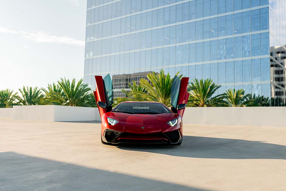 Lamborghini Aventador SV Red at dusk Orange County exotic rental