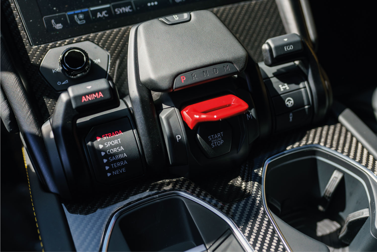 Black Lamborghini Urus S front quarter angle Pacific Coast Highway