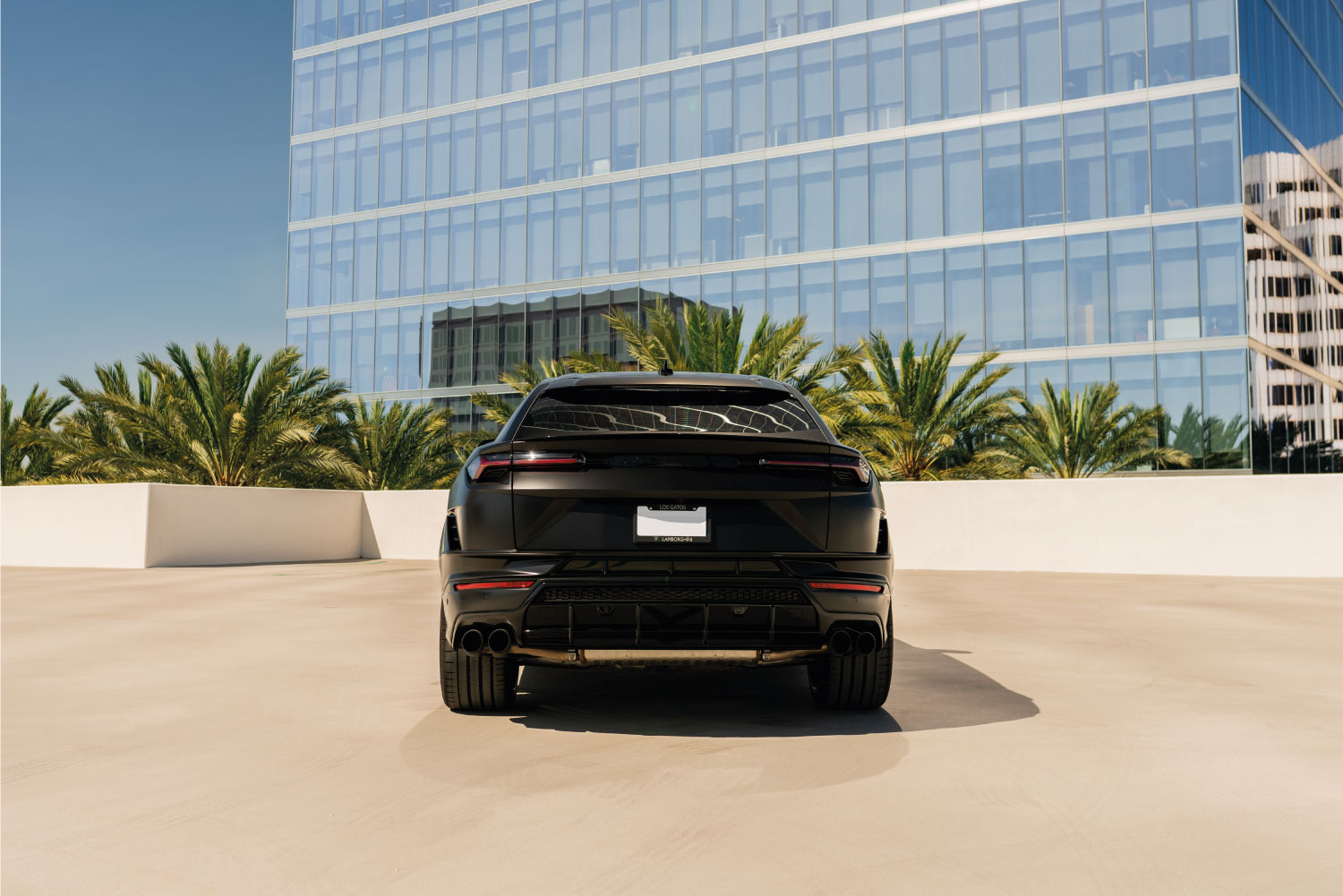 Lamborghini Urus S Black at dusk Orange County exotic rental