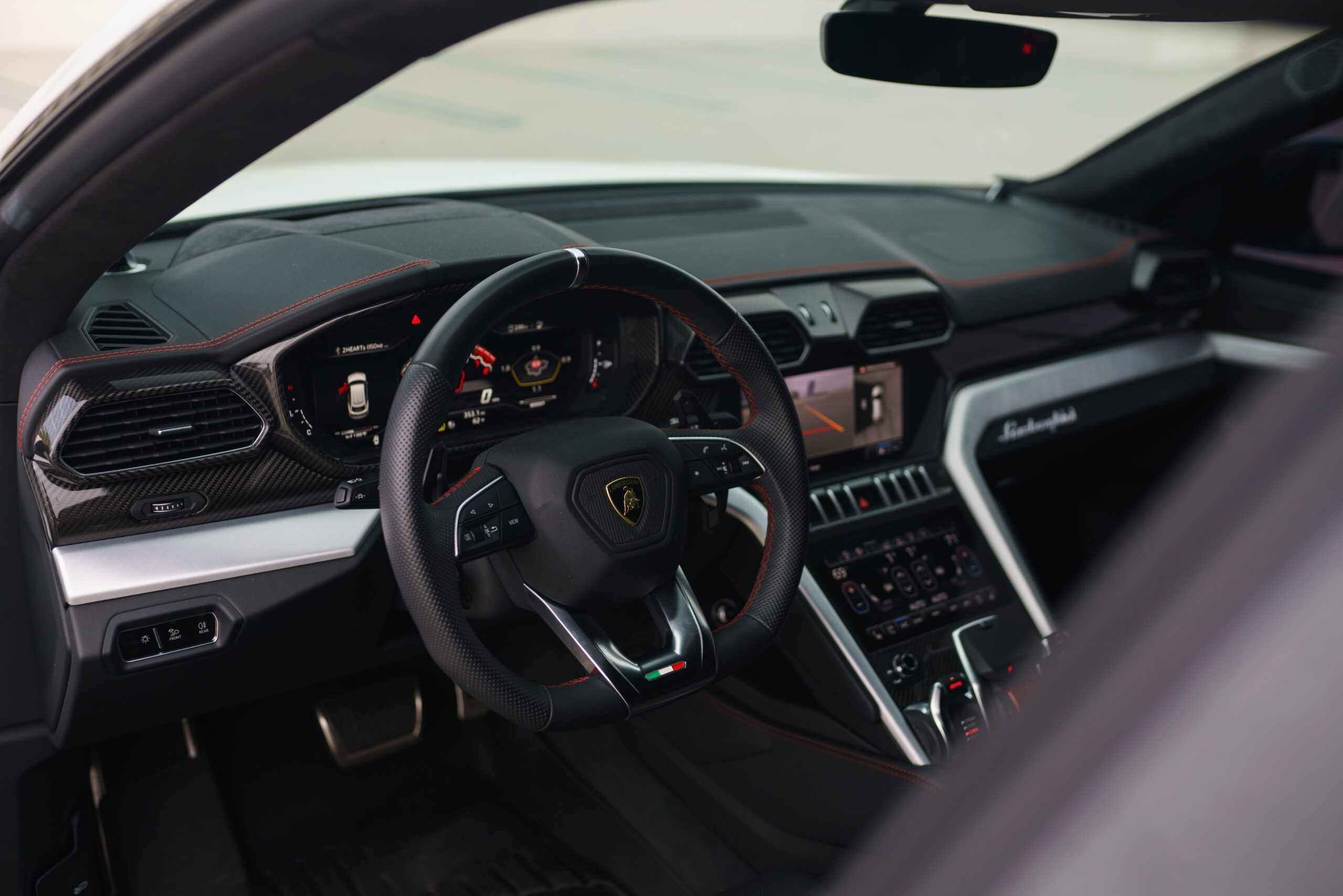 Lamborghini Urus Matte White trunk view luxury rental Pacific Coast Highway