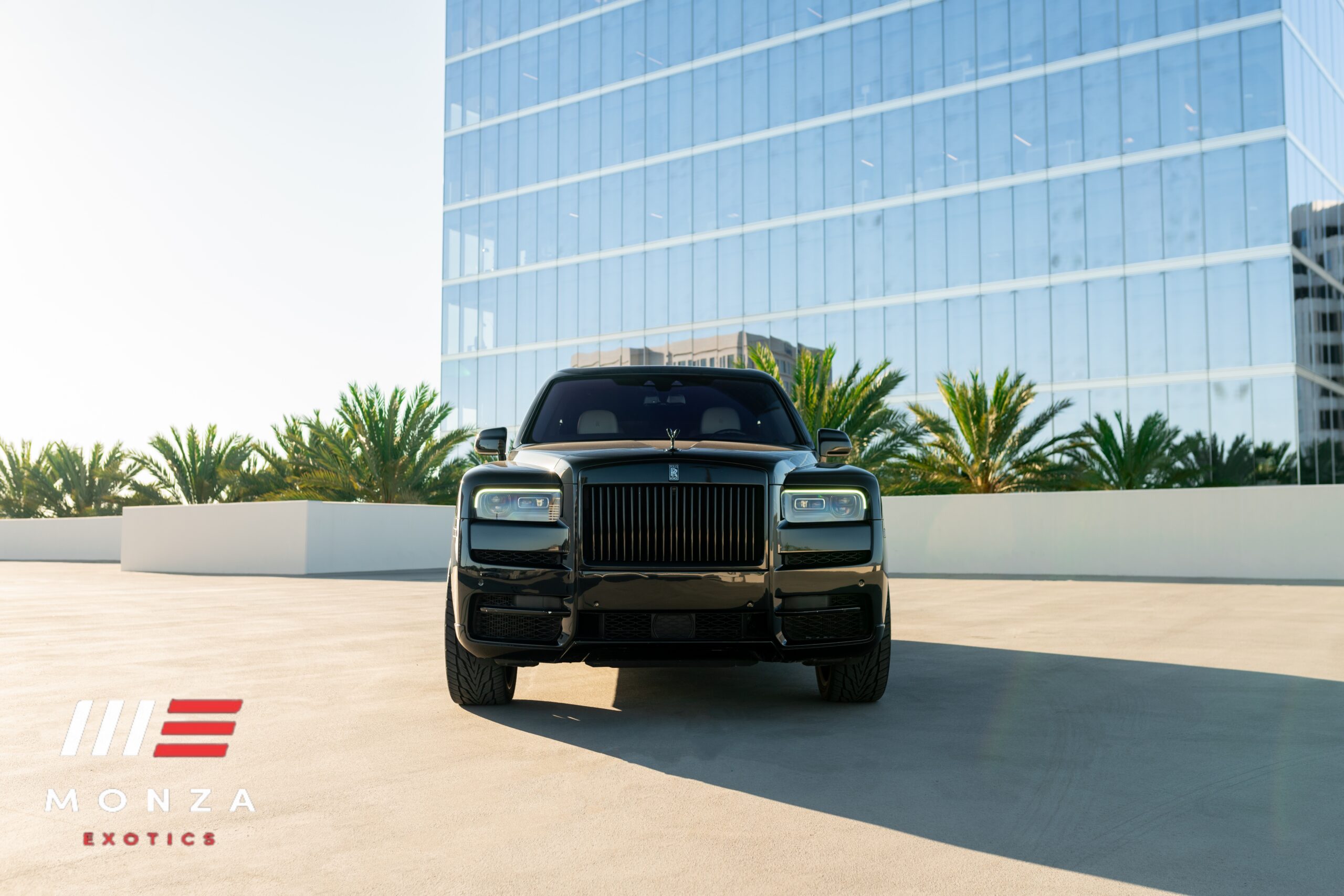 2024 Rolls Royce Cullinan Black rear view exotic car rental