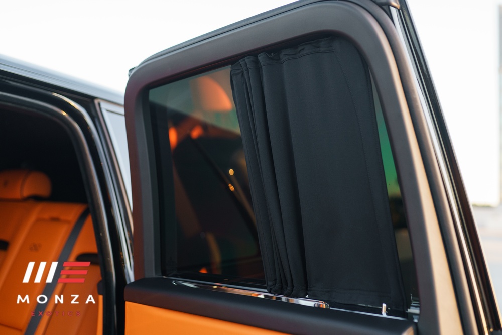 Black Rolls Royce Cullinan Black Badge front quarter angle Newport Beach