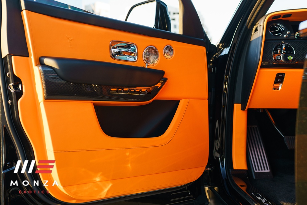 Rolls Royce Cullinan Black Badge rear view Black luxury SUV San Diego