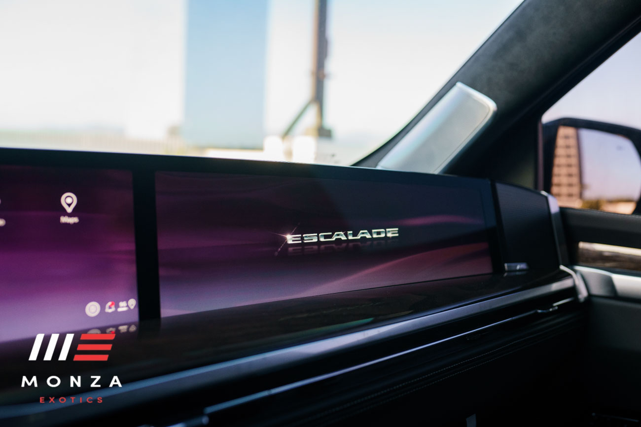 Cadillac Escalade Platinum Sport Black rear quarter view Los Angeles exotic rental