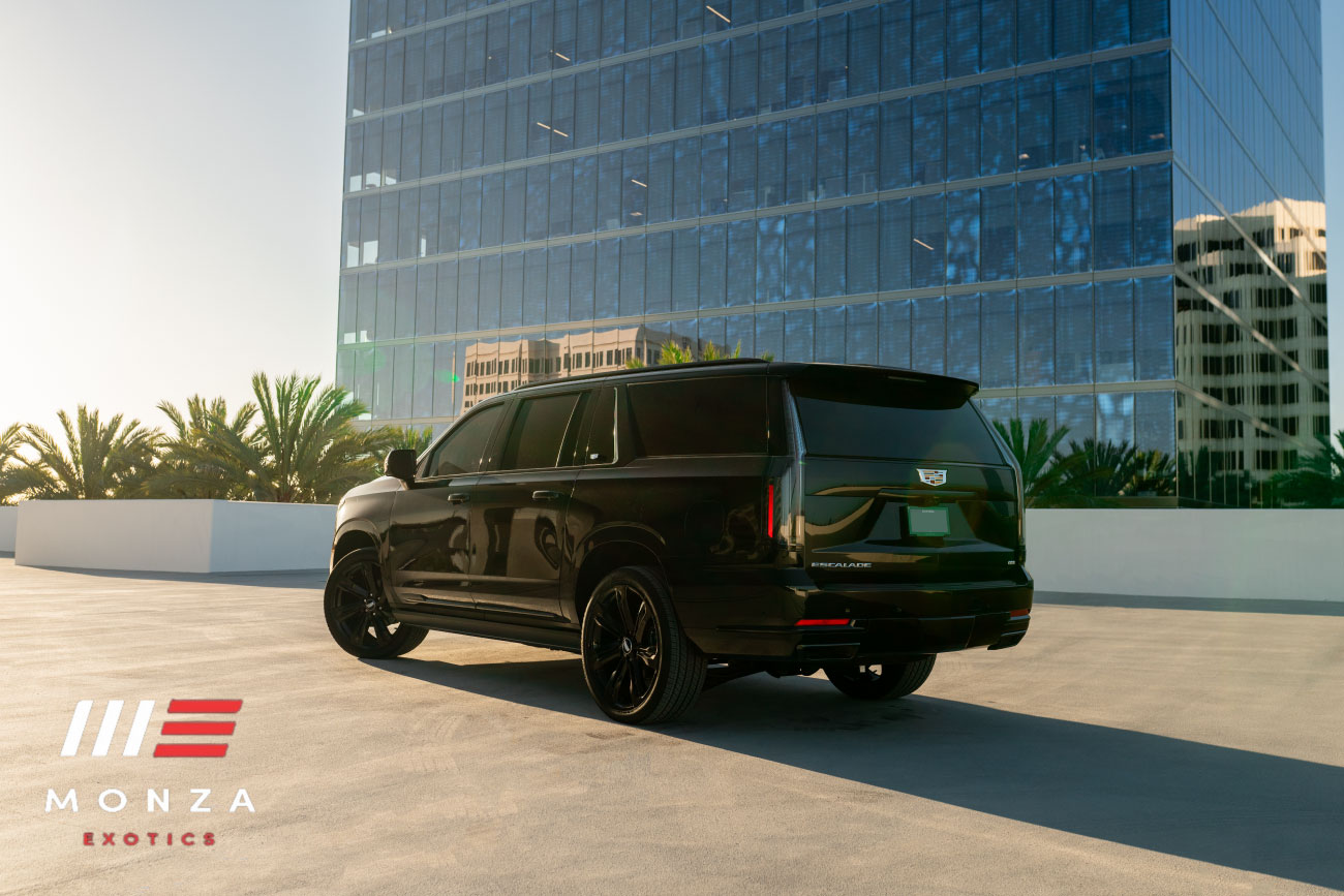 2025 Cadillac Escalade Platinum Sport front three-quarter Black SoCal exotic rental