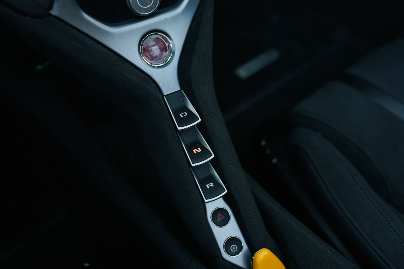 McLaren 750S Spyder Yellow trunk view luxury rental Pacific Coast Highway