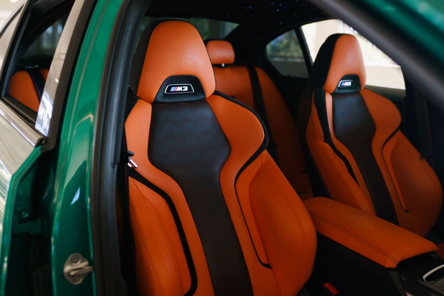 BMW M3 Competition Green rear quarter view Los Angeles