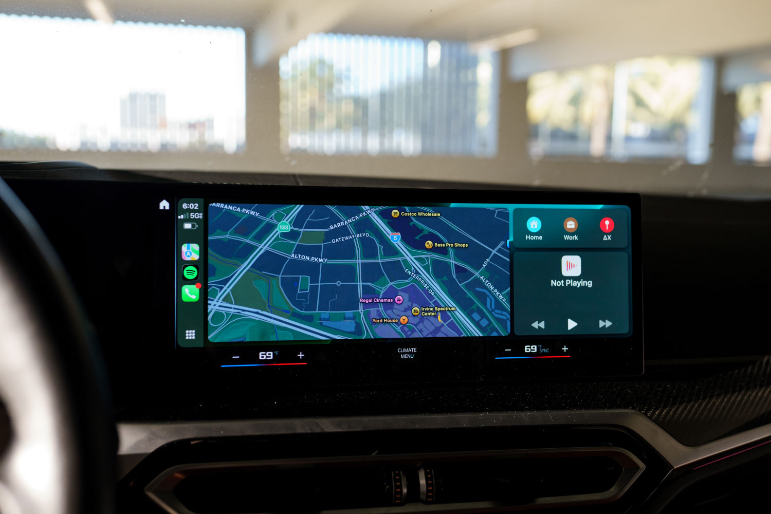 BMW M3 Competition Green close-up luxury sedan rental Newport Beach