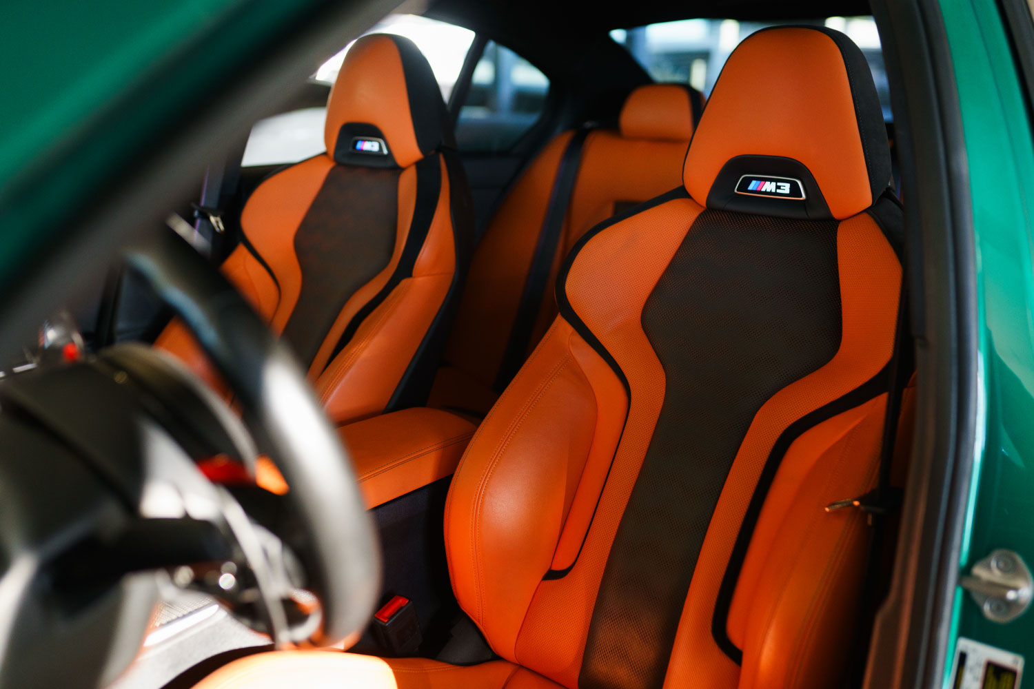 BMW M3 Competition Green close-up luxury sedan rental Newport Beach exotic rental