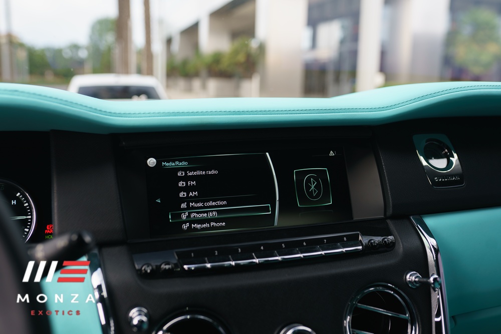 Rolls-Royce Cullinan White trunk view luxury rental Pacific Coast Highway