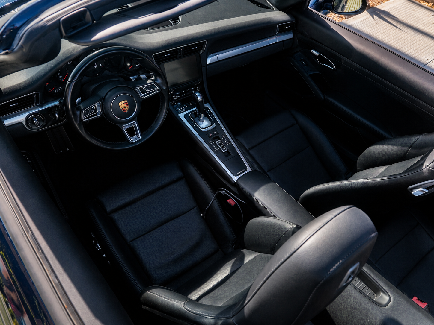 Porsche 911 Carrera black leather dashboard and center console