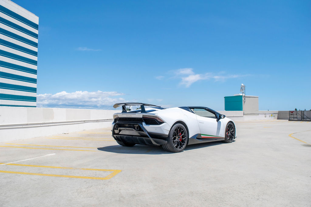 Lamborghini Huracan rental in white, a 2 door coupe with a twin-clutch gearbox
