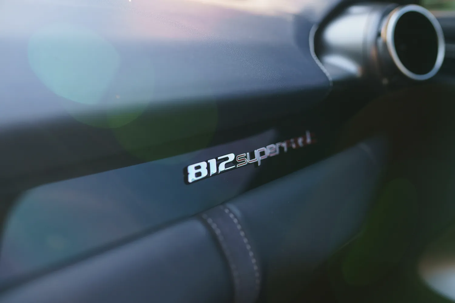 White Ferrari 812 Superfast rental, a V12 berlinetta with rear-wheel steering