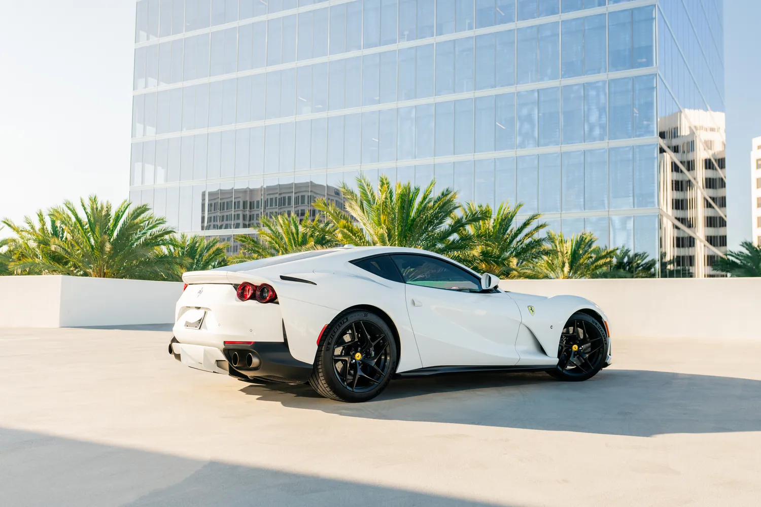 White Ferrari 812 Superfast rental, reaching 60 mph in 2.9 seconds