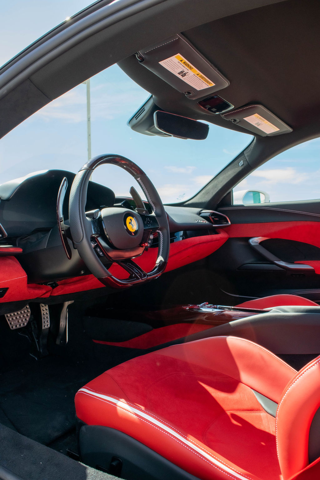 Ferrari 296 GTB rental, a 2 seat supercar with a 205 mph top speed
