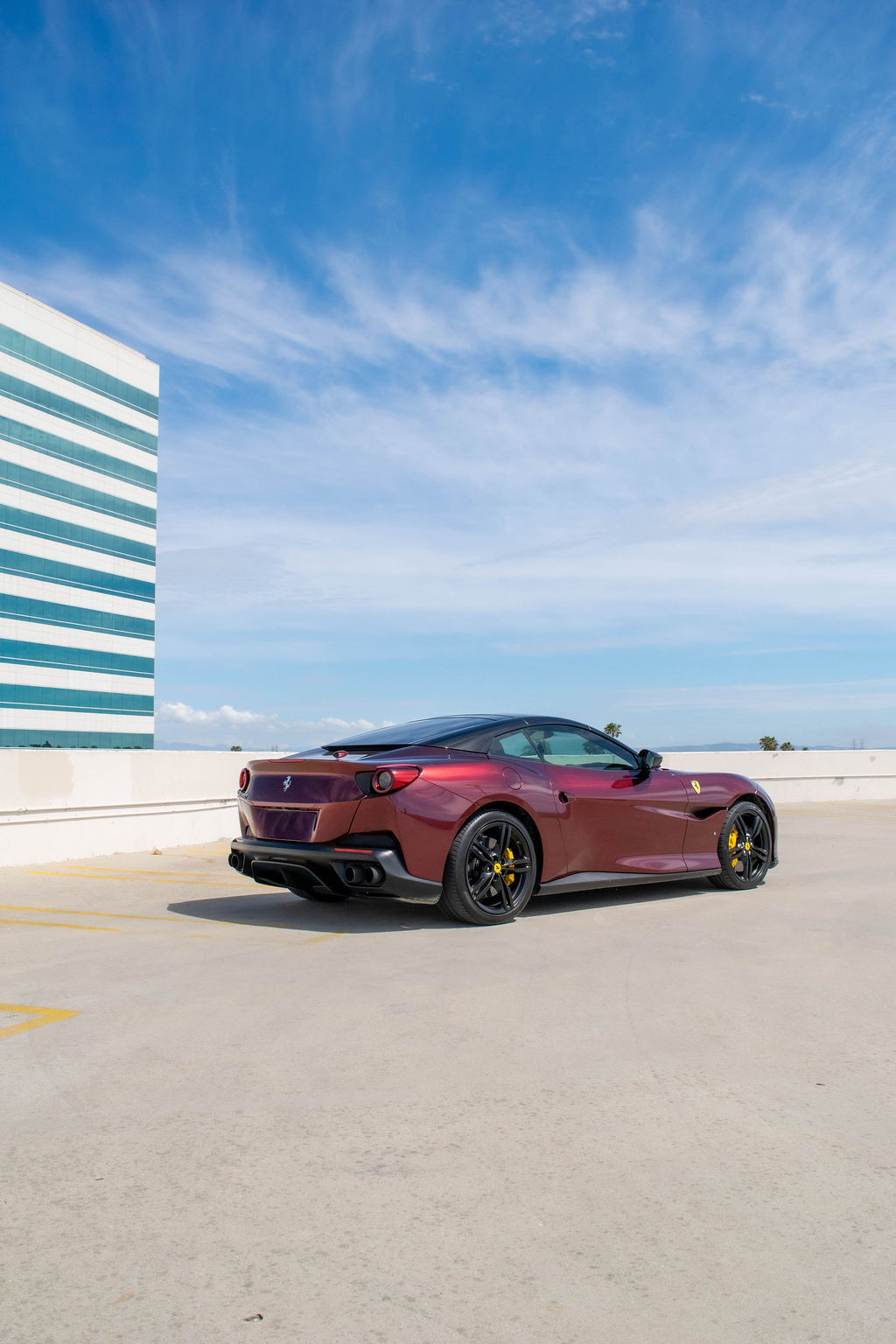 Burgundy Ferrari Portofino rental, a 3.9 liter twin-turbo V8 grand tourer
