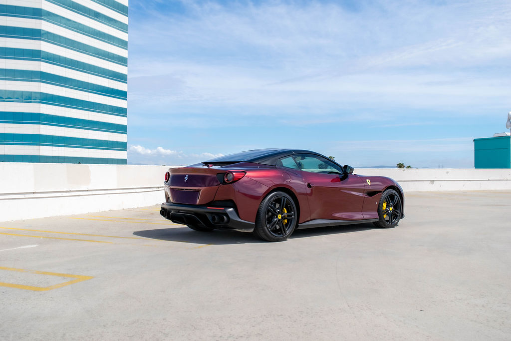 Burgundy Ferrari Portofino rental, reaching 60 mph in 3.2 seconds