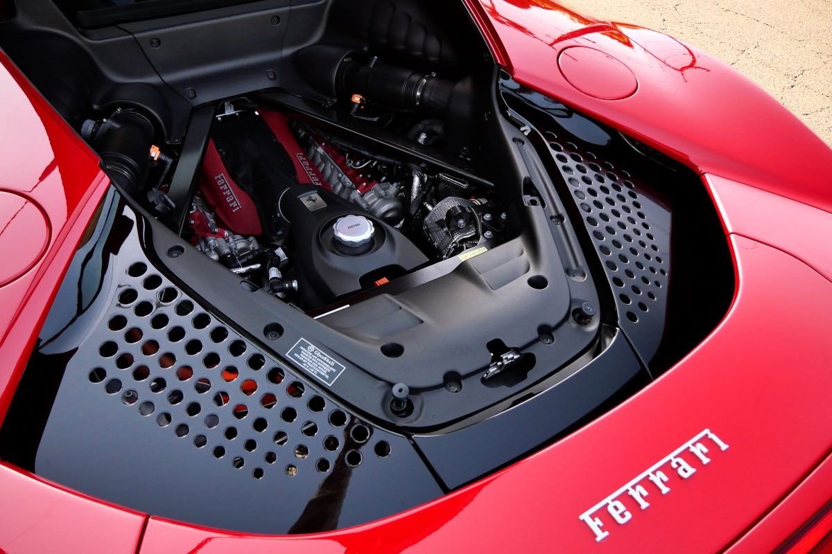 Engine bay of the Ferrari SF90 Stradale rental, a 4.0 liter twin-turbo V8