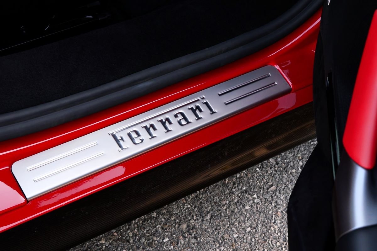 Door sill on the Ferrari SF90 Stradale rental, Ferrari's plug-in hybrid flagship