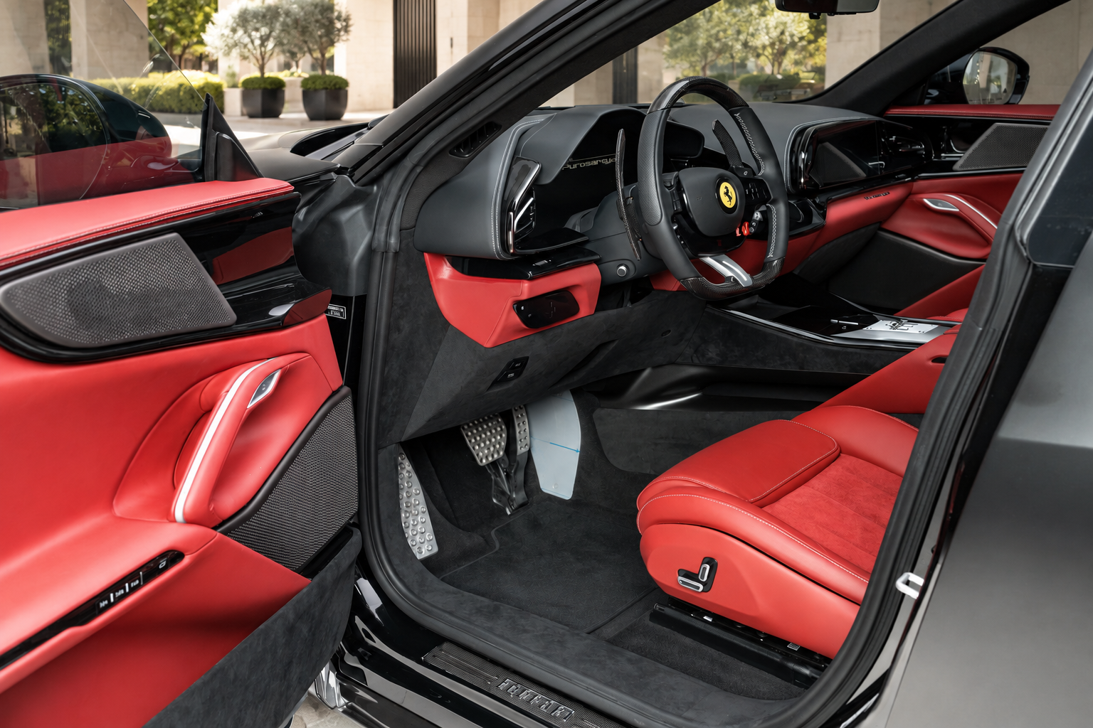 Interior door trim in the Ferrari Purosangue rental, the four door Ferrari