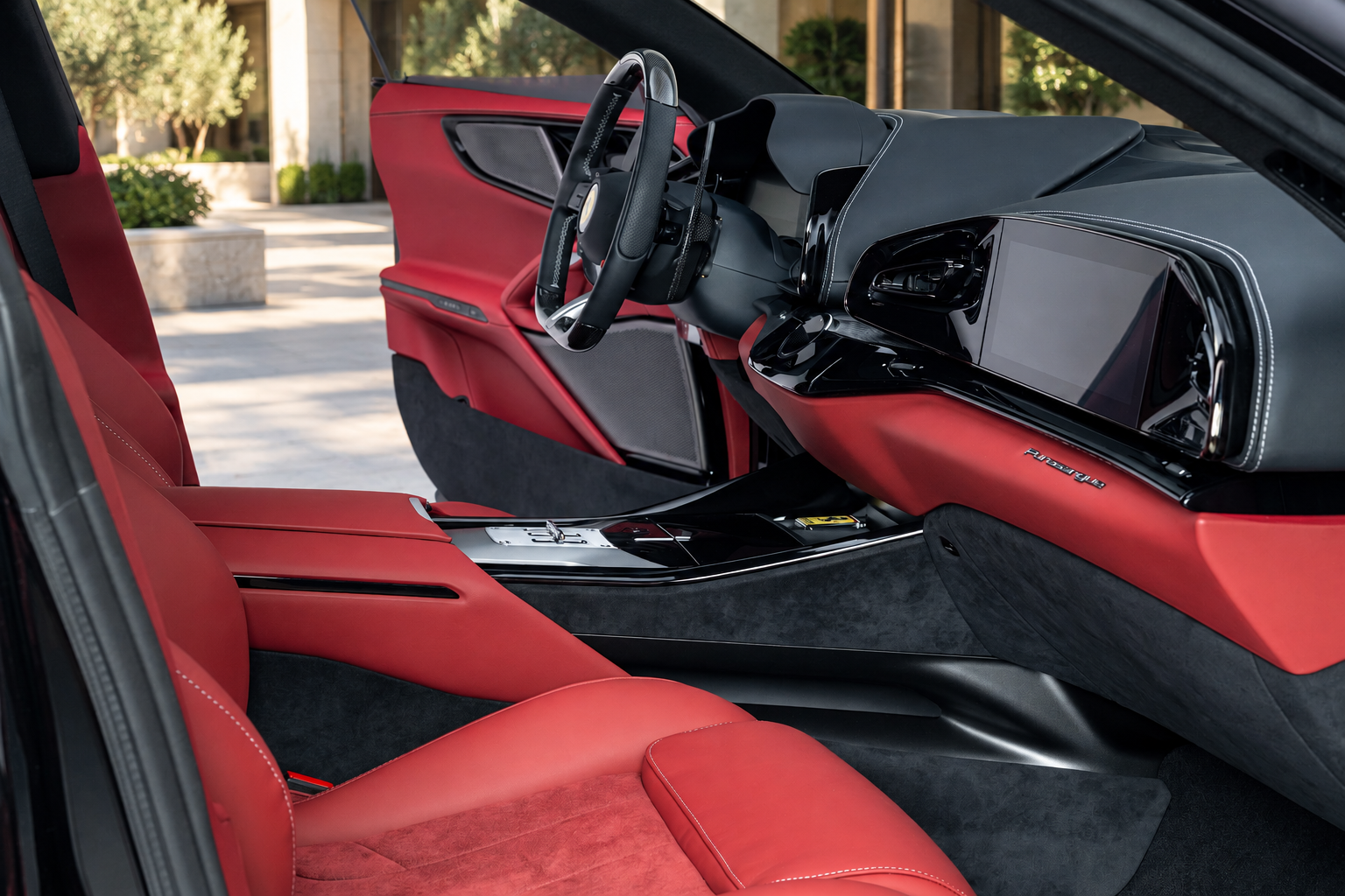 Dashboard of the Ferrari Purosangue rental, a naturally aspirated V12 seating 4