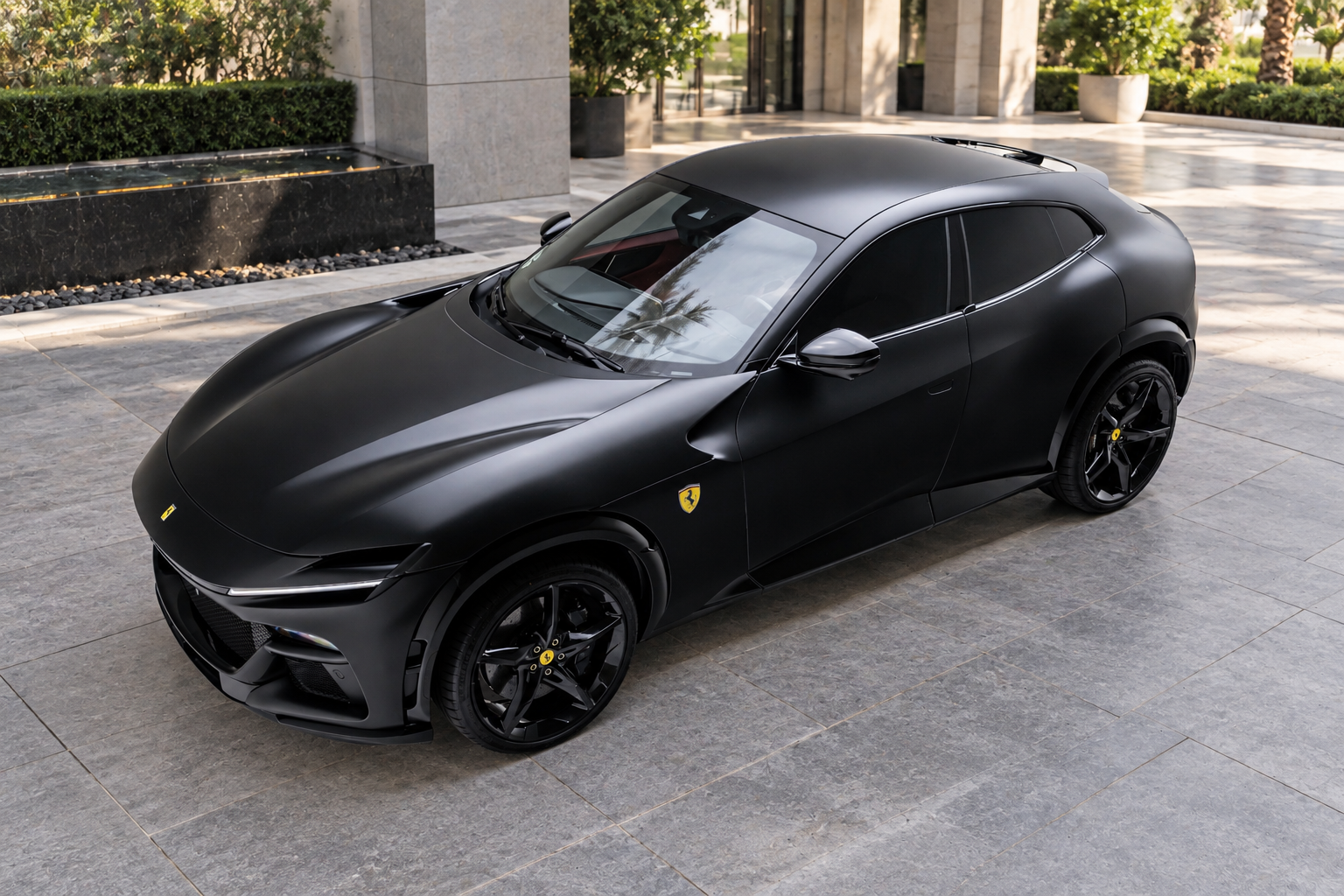 Front view of the black Ferrari Purosangue rental, a 715 hp V12