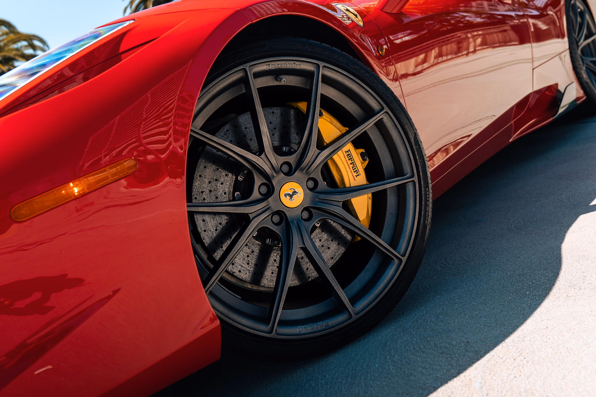Wheel on the red Ferrari 458 Italia rental, a 562 hp V8 supercar