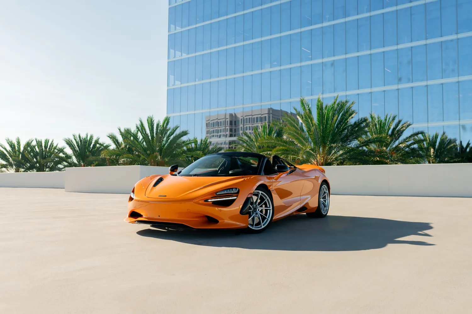 Orange McLaren 750S Spider, a 740 hp twin-turbo V8 to rent in Southern California