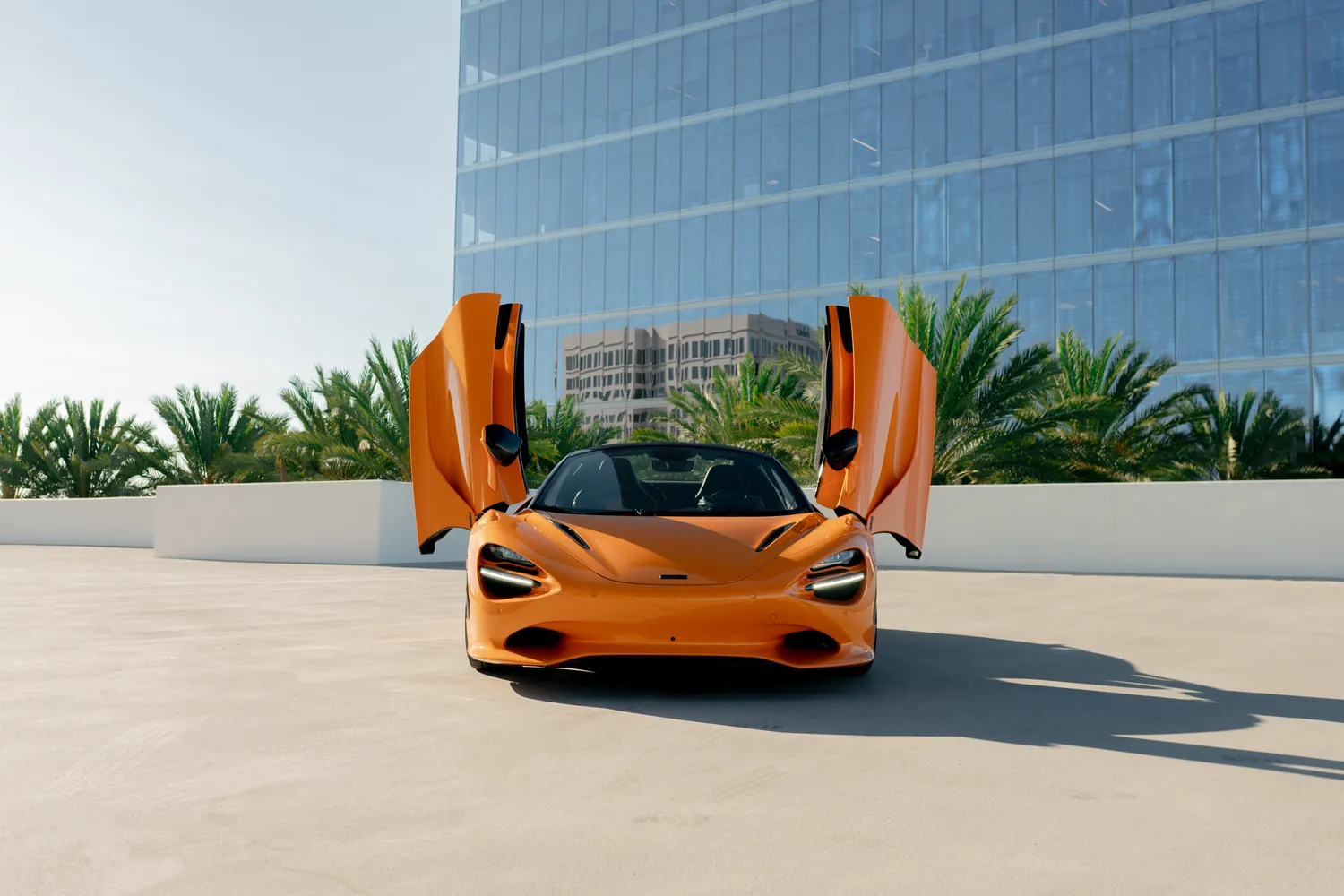 McLaren 750S rental, a 740 hp twin-turbo V8 supercar in orange