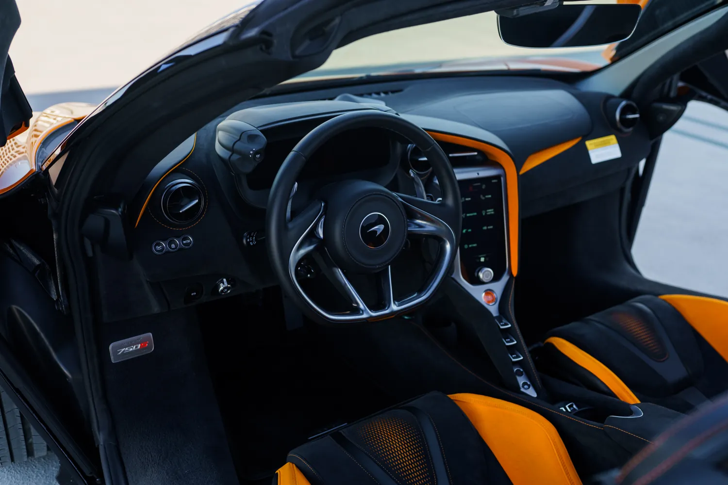 McLaren 750S rental in orange, the last McLaren built without a hybrid system