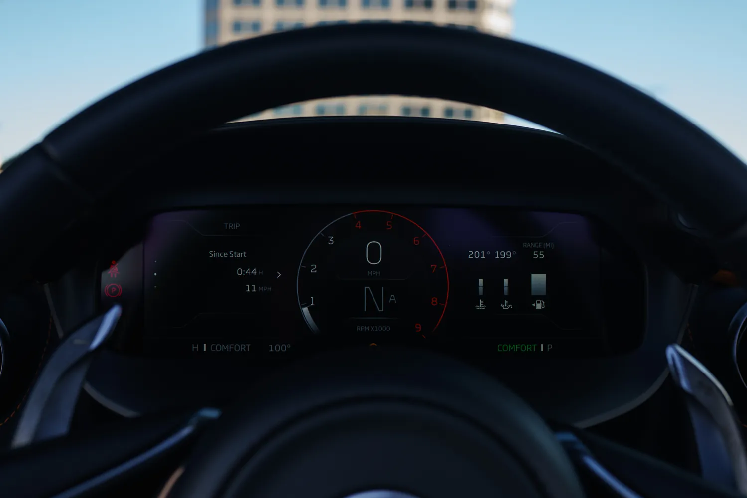Orange McLaren 750S rental, a 4.0 liter twin-turbo V8 with a centre-exit exhaust