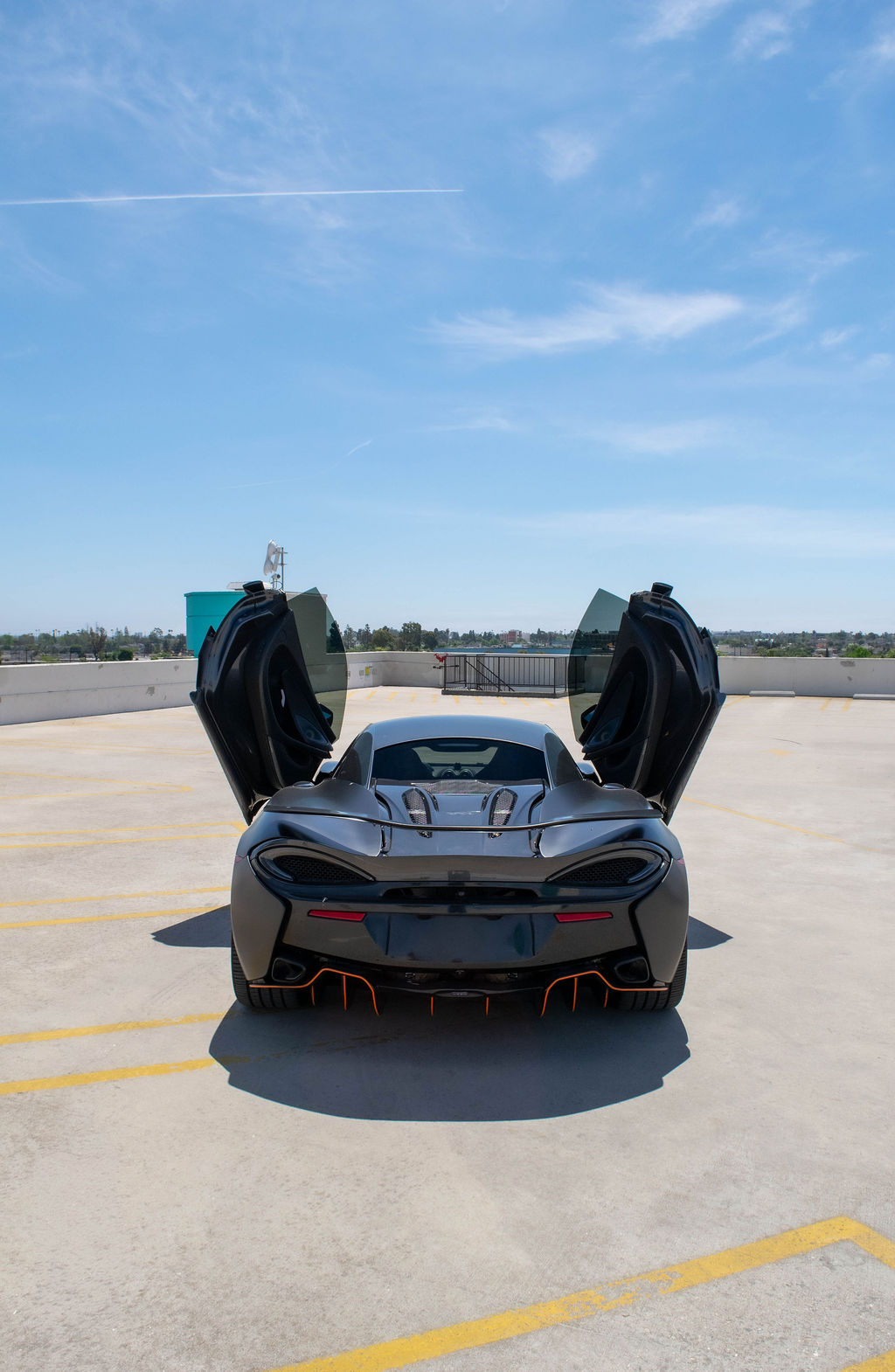 McLaren 570S rental in black, the lightest chassis in the McLaren range