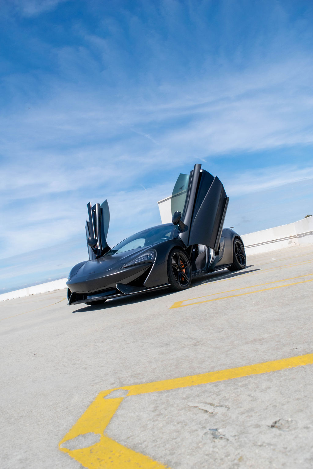 McLaren 570S rental, a rear-wheel drive supercar with a 204 mph top speed